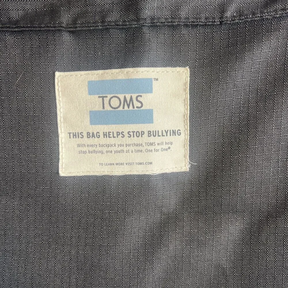 Toms StandUp Backpack Solid Black W/ Aztec detail Zipper Closure Fold-over Flaws